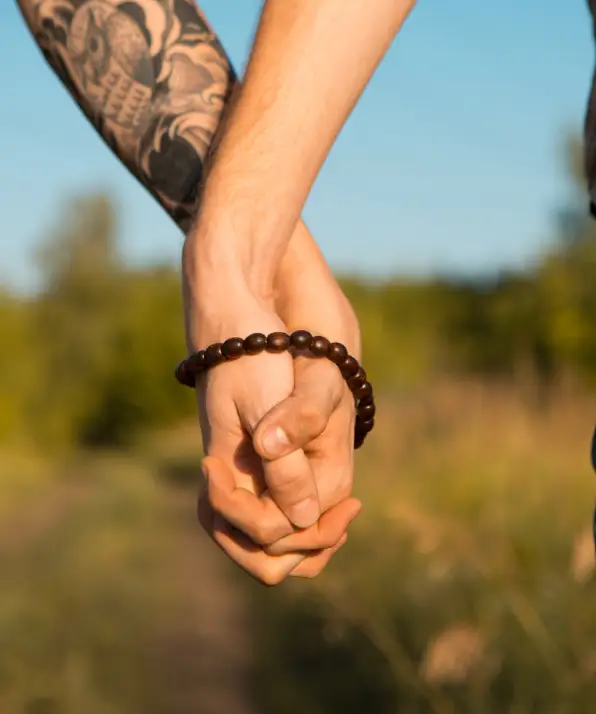 Image of two men Holding hands at gay Wedding Image of two men Holding hands at gay Wedding